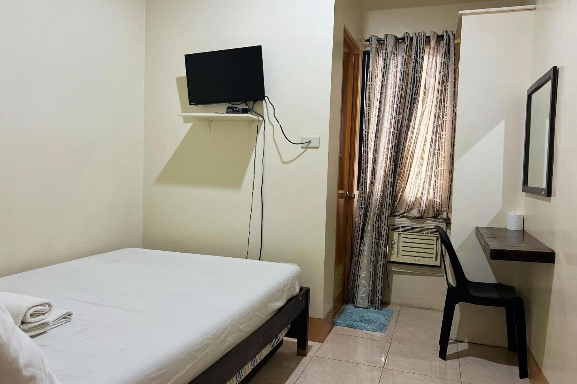 Sta Rosa Inn Iloilo Powered By Cocotel Стая снимка