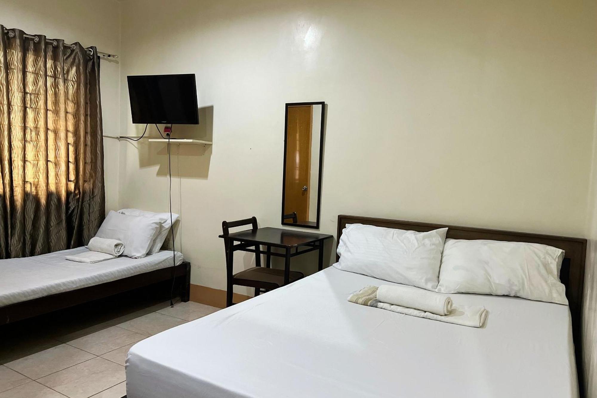 Sta Rosa Inn Iloilo Powered By Cocotel Стая снимка
